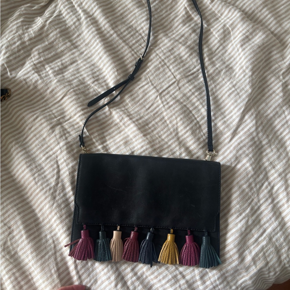Rebecca Minkoff 100% leather cross body purse with Tassels